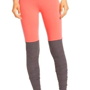 Alo Goddess legging. Salmon color. Ribbed grey bottom.
